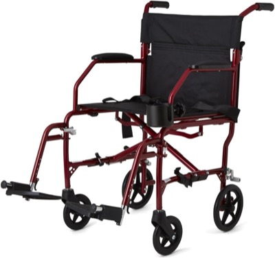 red aluminum folding transport wheelchair with black upholstery, a cup holder and swing-away footrests